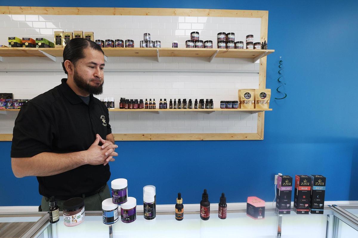 Asad Shalami, owner of ZAR Wellness, shows some of the products at his standalone shops across Texas on Wednesday, May 3, 2023, in Keller. Shalami, a US Army veteran, started the business to bring hemp-based products as an alternative choice for veterans suffering from ailments. He supports regulation of the industry to ensure only high-quality products are on the market.