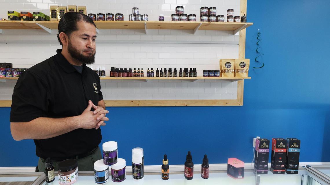 Asad Shalami, owner of ZAR Wellness, shows some of the products at his standalone shops across Texas on Wednesday, May 3, 2023, in Keller. Shalami, a US Army veteran, started the business to bring hemp-based products as an alternative choice for veterans suffering from ailments. He supports regulation of the industry to ensure only high-quality products are on the market.