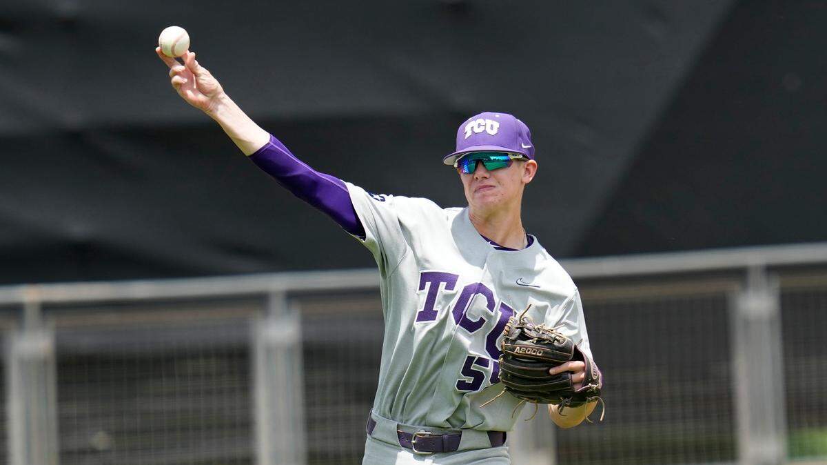 TCU infielder Brayden Taylor (55) throws to first against Oral Roberts during an NCAA baseball game on Saturday, June 4, 2022, in College Station, Texas. The Horned Frogs are trying to get back to the NCAA playoffs in 2023. 