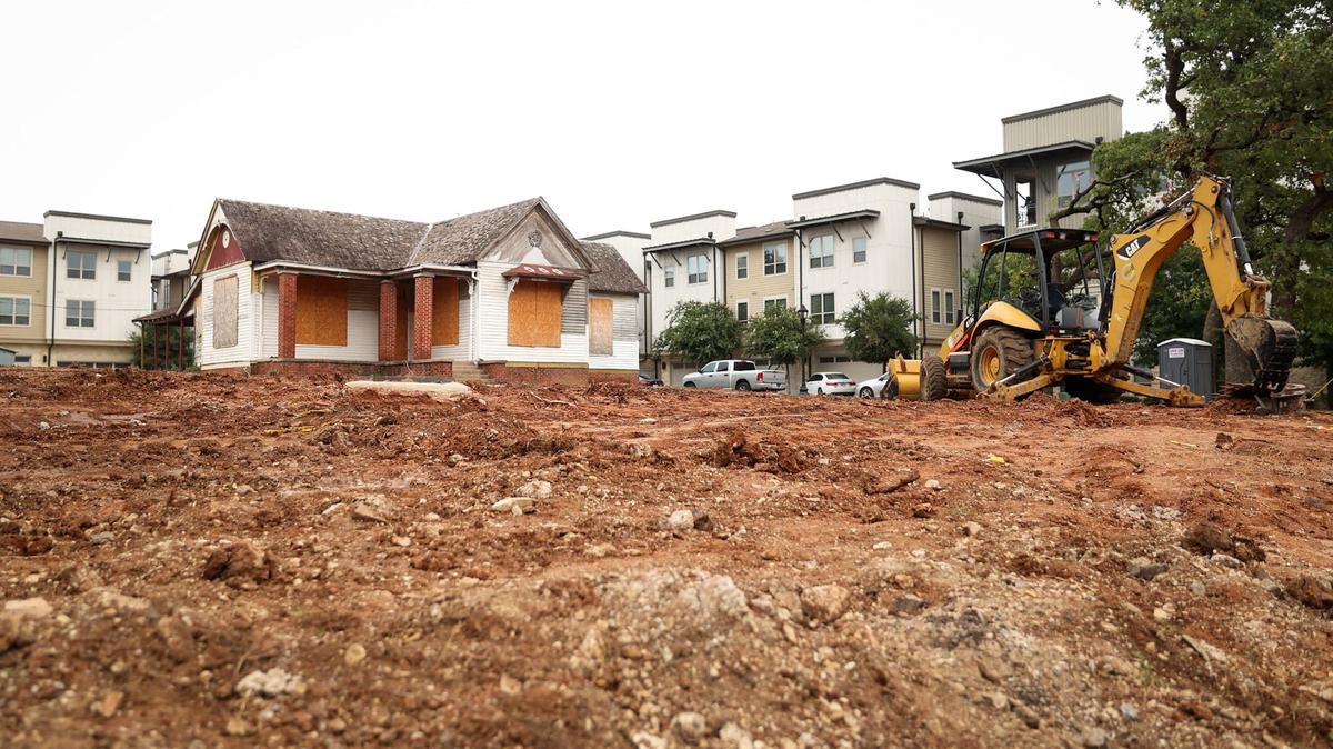 What remains of the late 19th century Reilly-Lehane house, surrounded by new apartments. The city is weighing the demolition of the historic home to allow more residential development.