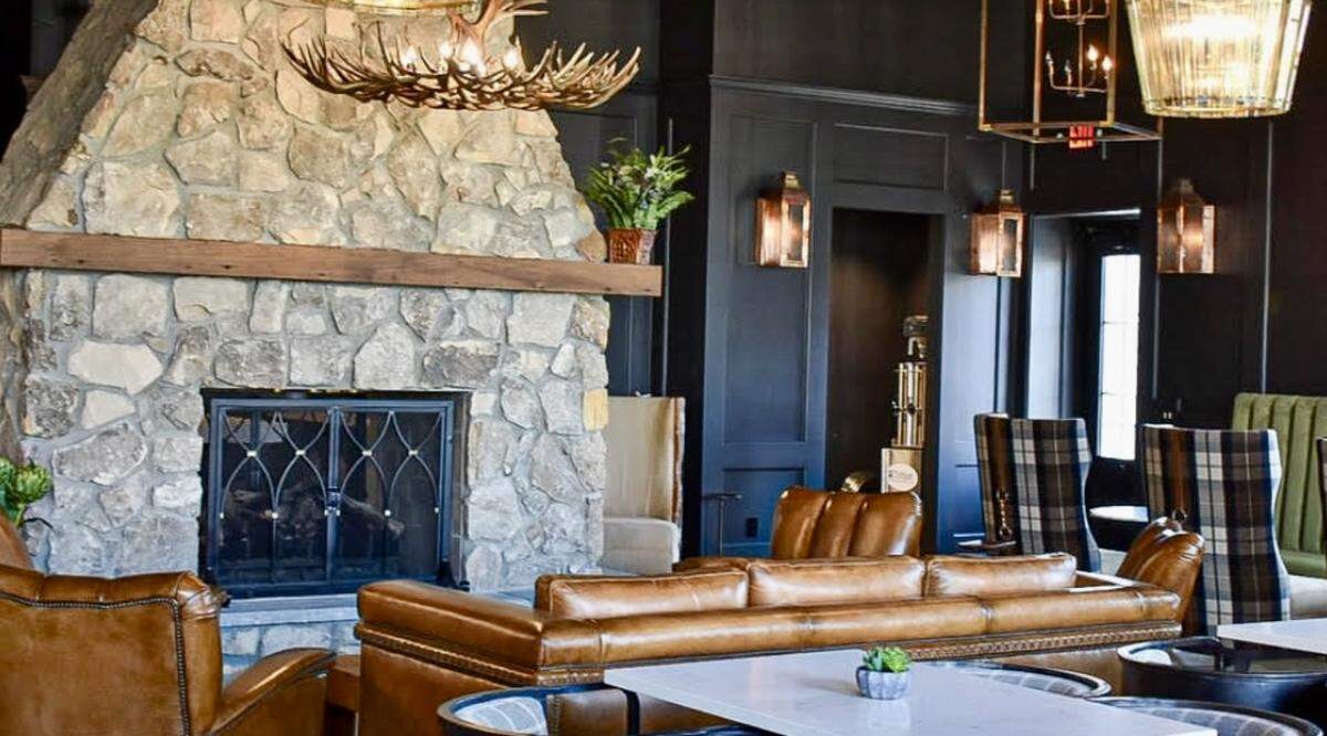 The Commander’s Club couch at fireplace at the Horse Soldier tasting room in Somerset, Kentucky, affiliated with The Urban Stillhouse.