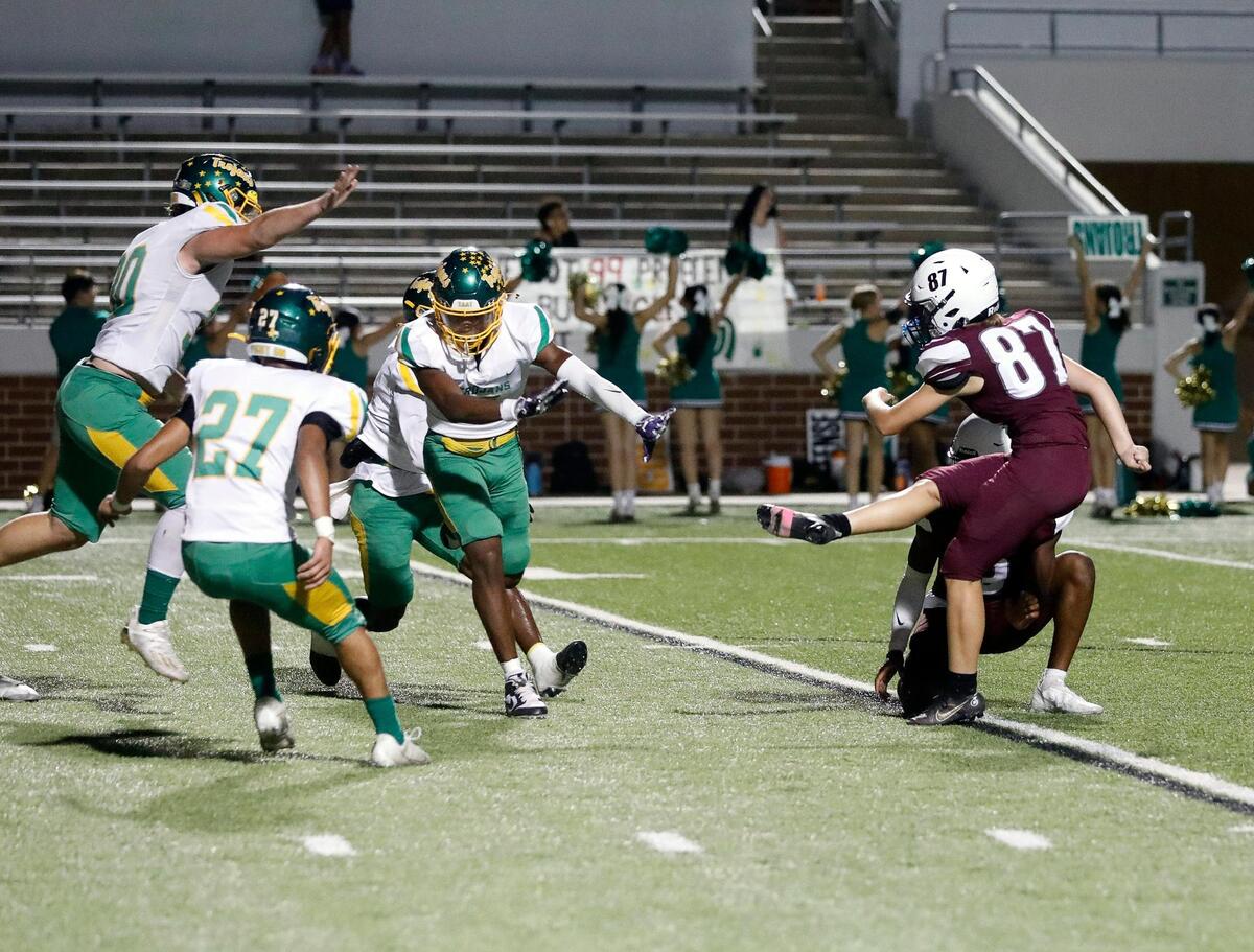Timberview kicker Emma Young (87) kicks an extra point in the second half of a high school football game at Vernon Newsom Stadium in Mansfield Texas, Thursday, Sept. 22, 2022.