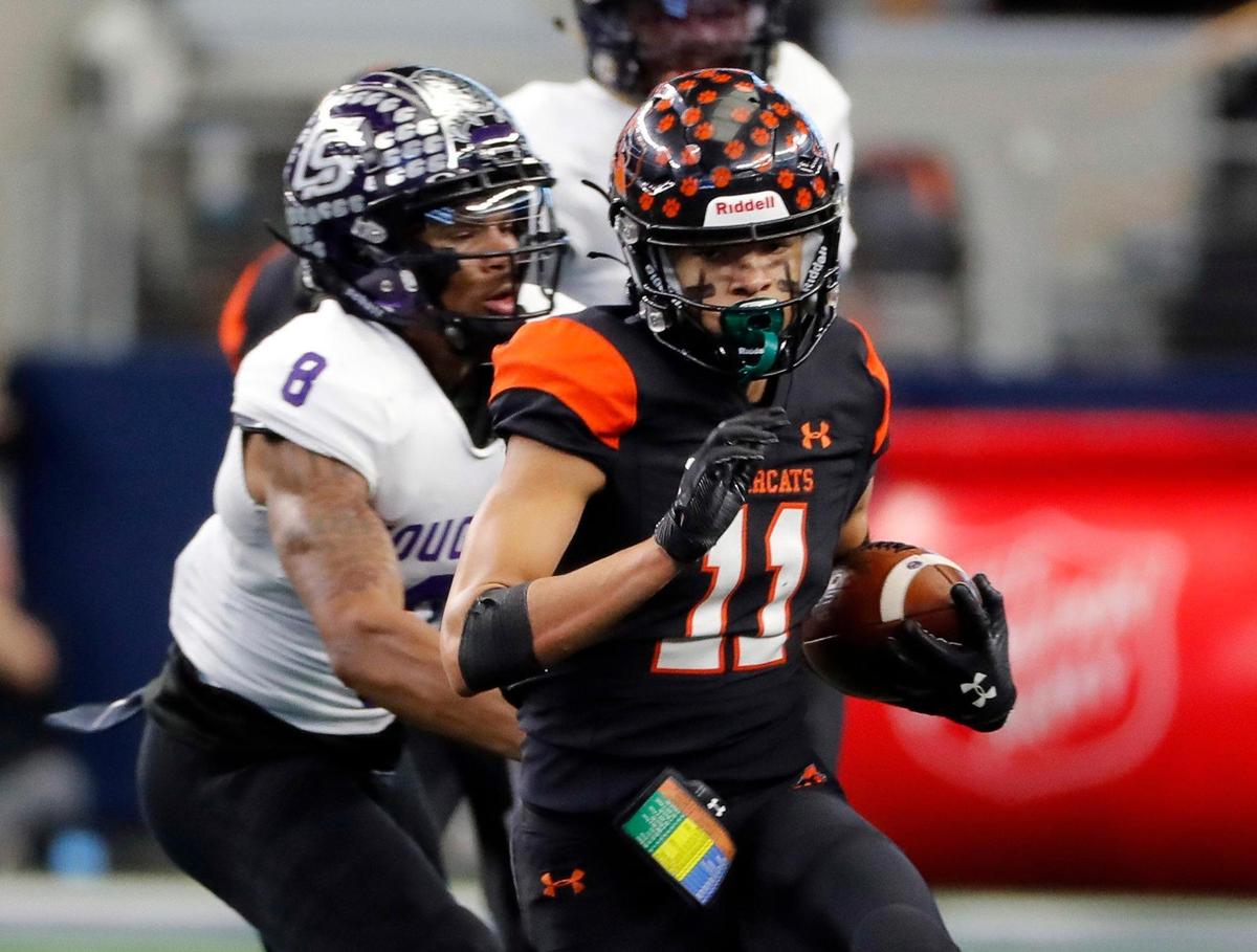 Aledo wide receiver Jalen Pope (11) gets away trom College Station defensive back Anthony Tisdell Jr. (8) in the first half of a UIL Class 5A D1 state championship football game at AT&T Stadium in Arlington, Texas, Saturday, Dec. 16, 2022. Aledo led 35-0 at the half. (Star-Telegram Bob Booth)