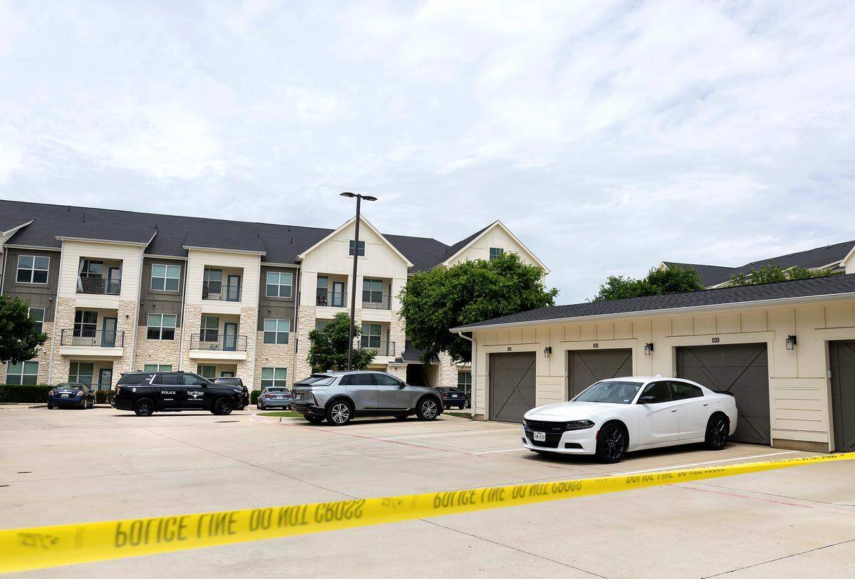 Fort Worth police respond to an officer-involved shooting on Tuesday, May 5, 2026, at an apartment complex in the 3600 block of Outlet Boulevard, near Tanger Outlets mall on the city’s far north side.