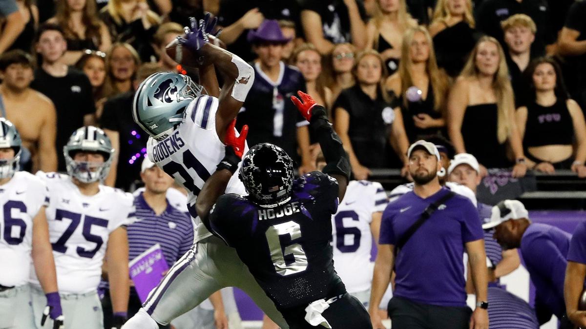 Kansas State running back DJ Giddens (31) grabs a pass defended by TCU linebacker Jamoi Hodge (6) in the first half of their game Oct. 22 in Fort Worth. The Horned Frogs trailed 28-10 before rallying for the victory. The teams meet against Saturday in the Big 12 Championship Game in Arlington.