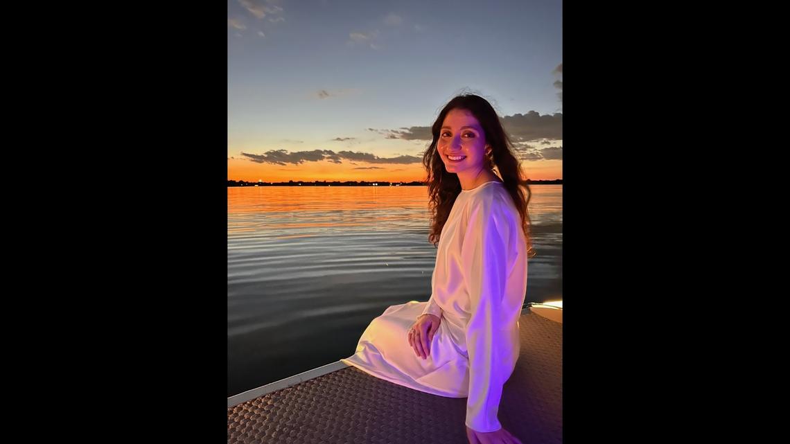 Ward Sakeik, a Palestinian refugee who lives in North Texas, poses in front of an ocean sunset.