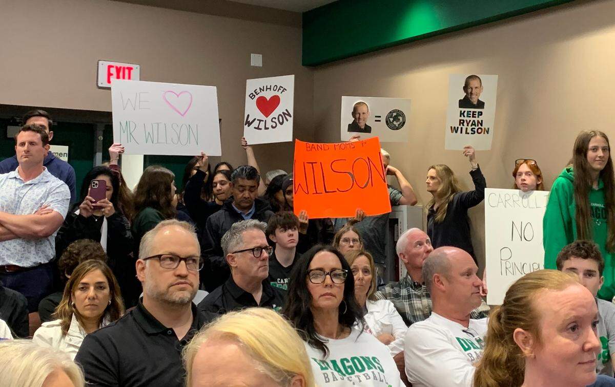Of the hundreds who came to protest staffing changes, 54 signed up to tell the Carroll ISD Board of Trustees that they don’t trust the decisions the board is making in forcing beloved principals, directors and coaches out.