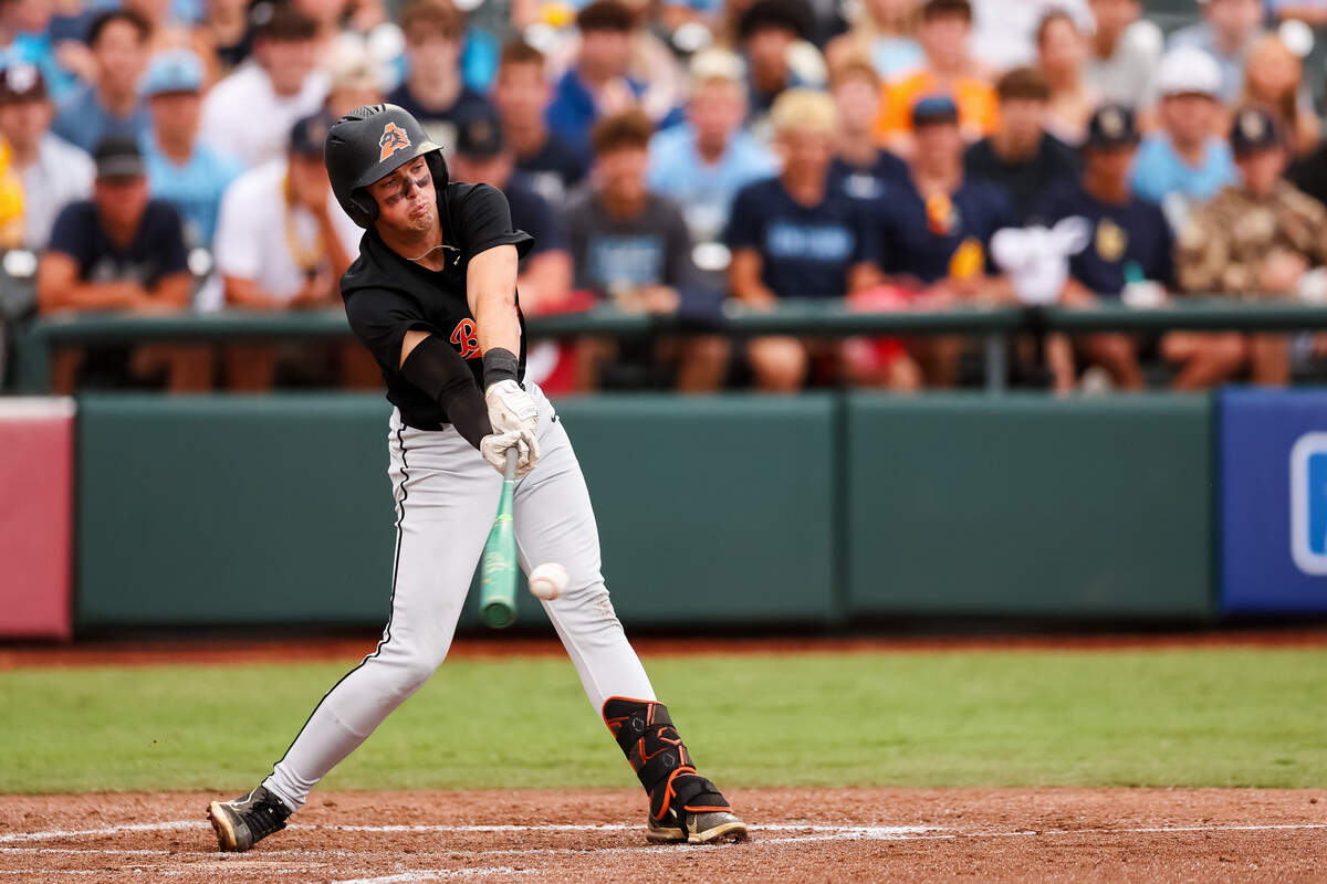Aledo second baseman Landon Barnes (8) sticks his bat out to make contact with the ball against Montgomery Lake Creek in the UIL Class 5A Division I baseball state championship game on Friday, June 5, 2026, at Dell Diamond in Round Rock, Texas.