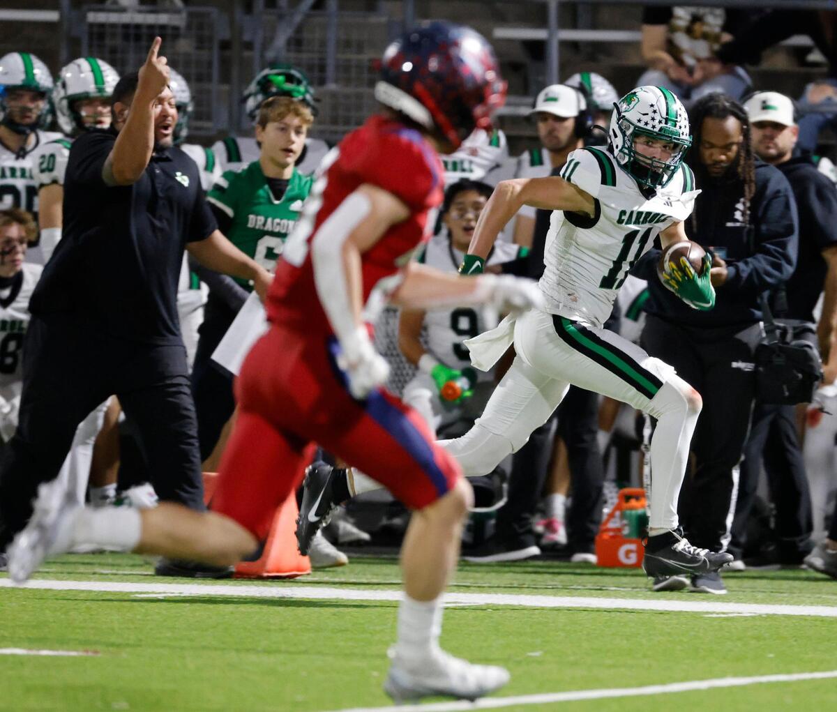 Southlake wide receiver Brock Boyd (11) runs the sidelines for six during a District 4 6A football game at Northwest ISD Stadium in Justin, Texas, Thursday, Oct. 17, 2024.