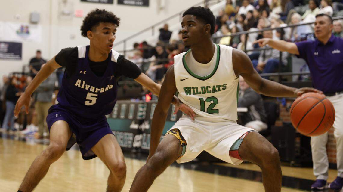 Alvarado guard Brendyn Webb (5) defends against Kennedale guard Jacoby Lovings (12) during the first half of a UIL boys basketball game between Alvarado and Kennedale at Kennedale High School in Kennedale, Texas, Tuesday Jan. 13, 2026
