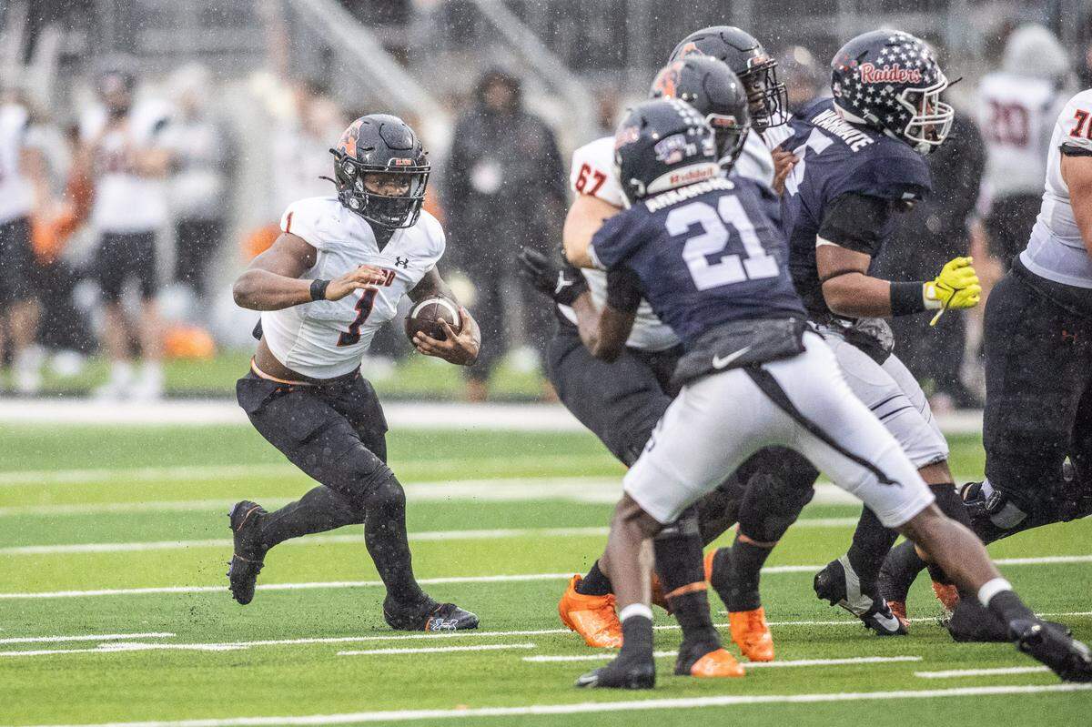 Aledo running back Raycine Guillory, Jr. (1) looks for running room against Denton Ryan in a Class 5A Division 1 state quarterfinal on Saturday, Dec. 7, 2024 at Crowley ISD Multi-Purpose Stadium in Fort Worth, Texas.