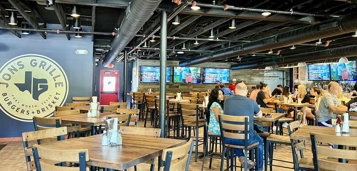 The cavernous dining room at Jon’s Grille featured TV sports, seen Sept. 10, 2022.