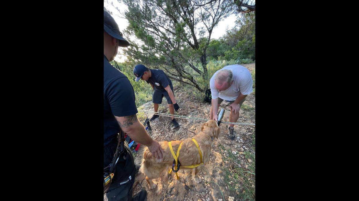 Stella and her rescuers.