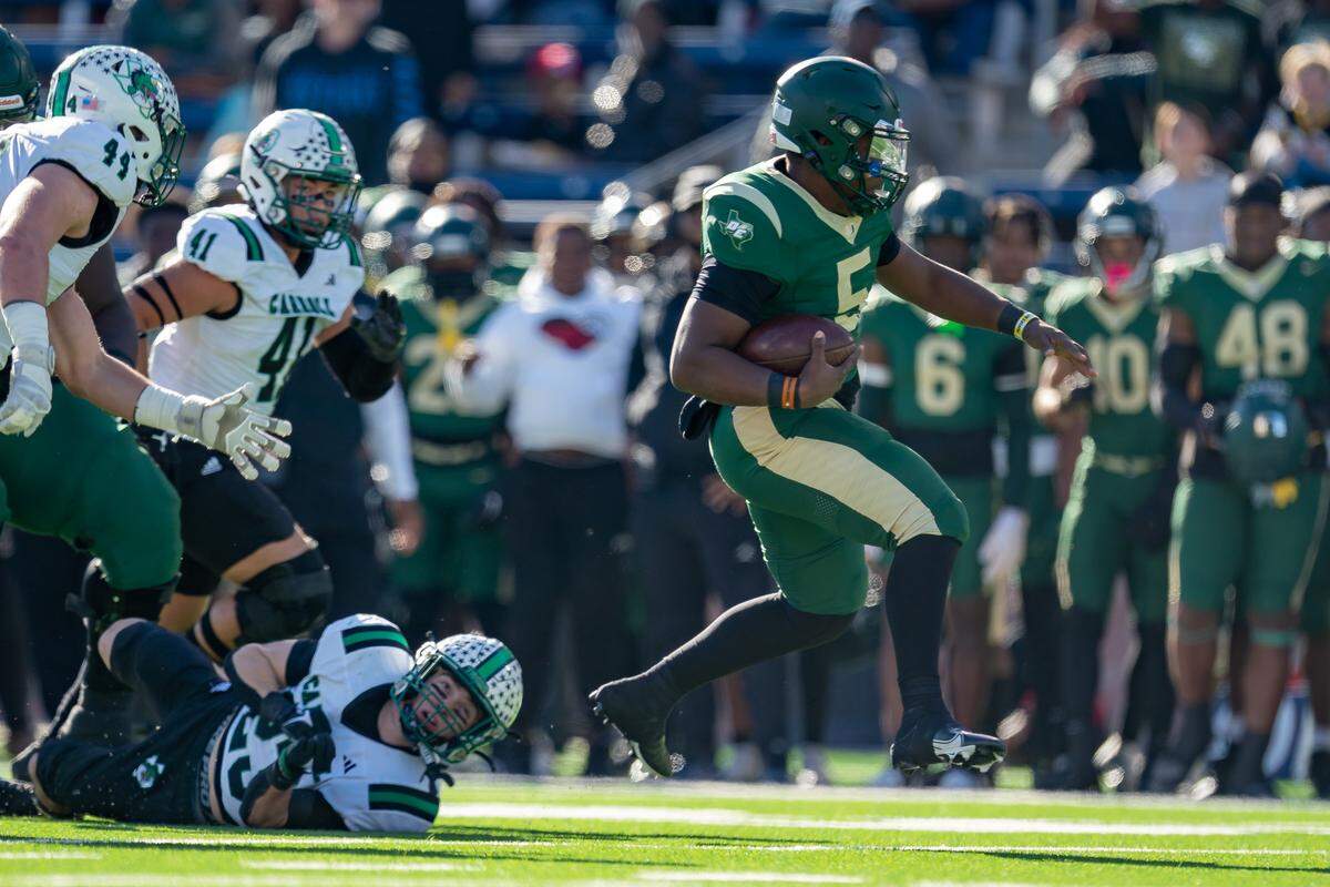 DeSoto quarterback DJ Bailey breaks free for a gain in a state semifinal win over Southlake Carroll in Allen, Texas on Dec. 9, 2023.