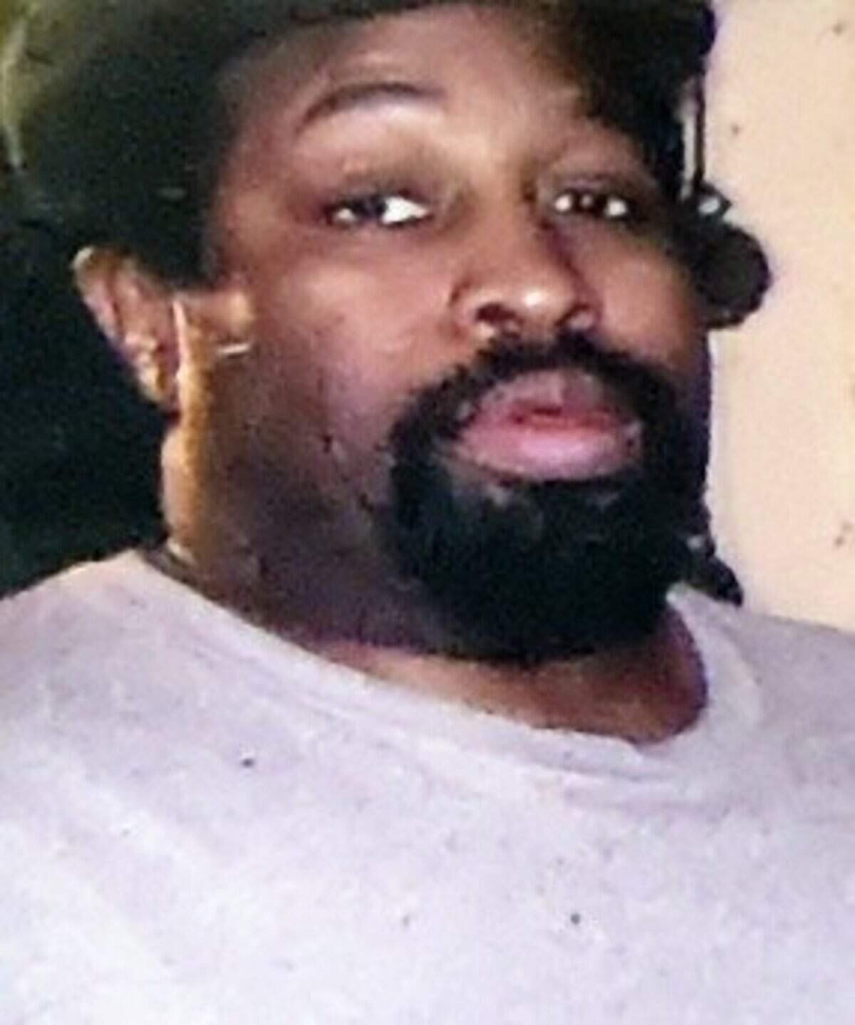 Family photo of Craigory Adams, shot while holding a barbecue fork by a Fort Worth police officer