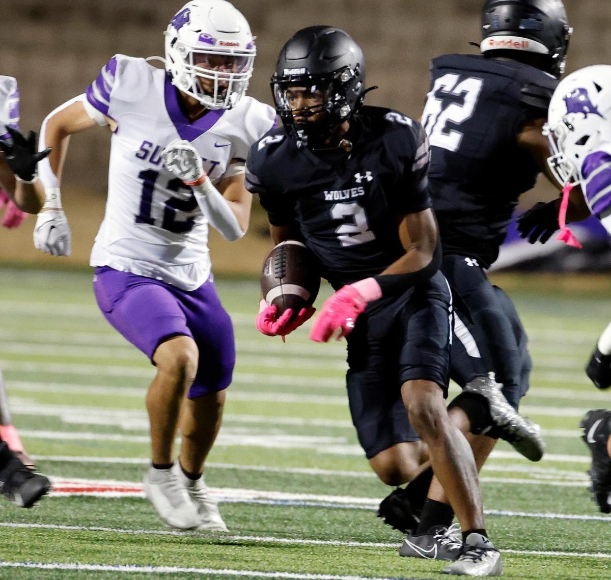 Timberview wide receiver Tyler Madison (2) goes through the Sunset’s defense in the first half of a UIL football game at Vernon Newsom Stadium in Mansfield, Texas, Thursday, Oct. 19, 2023.