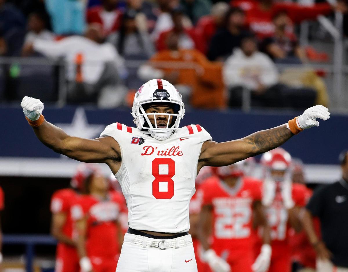 Duncanville defensive end Colin Simmons (8) celebrates a fumble recovery during the second half of the UIL Conference 6A Division 1 state championship football game at AT&T Stadium in Arlington, Texas, Saturday, Dec. 16, 2023.