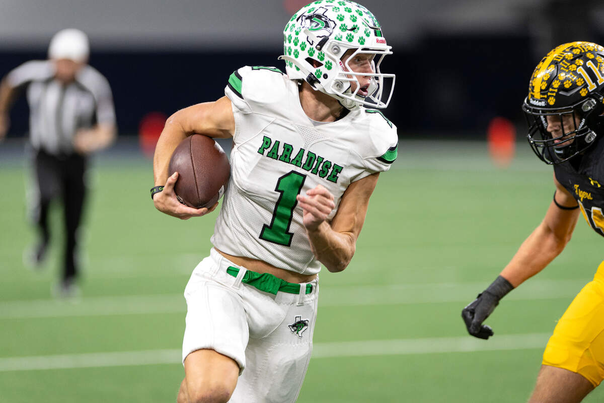 Paradise quarterback Ayden Winters (1) turns the corner against Malakoff in a Class 3A Division 1 state quarterfinal on Thursday, Dec. 12, 2024 at the Ford Center in Frisco, Texas.