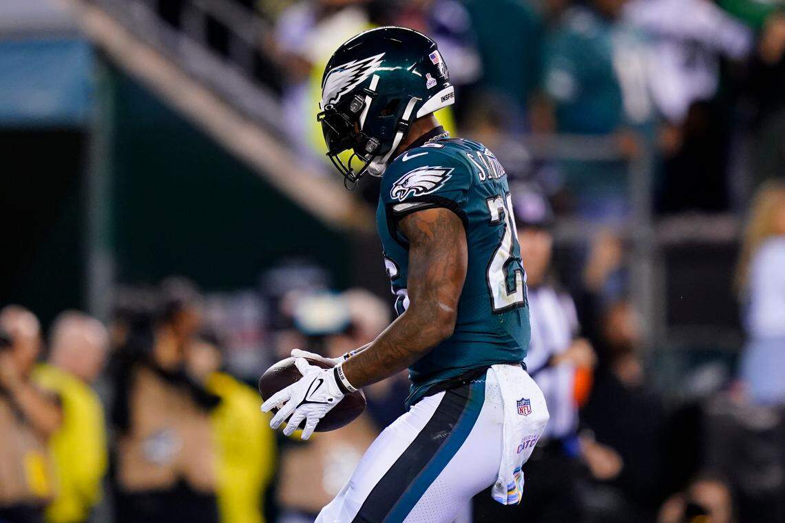 Philadelphia Eagles’ Miles Sanders celebrates a touchdown during the first half of an NFL football game against the Dallas Cowboys on Sunday, Oct. 16, 2022, in Philadelphia.