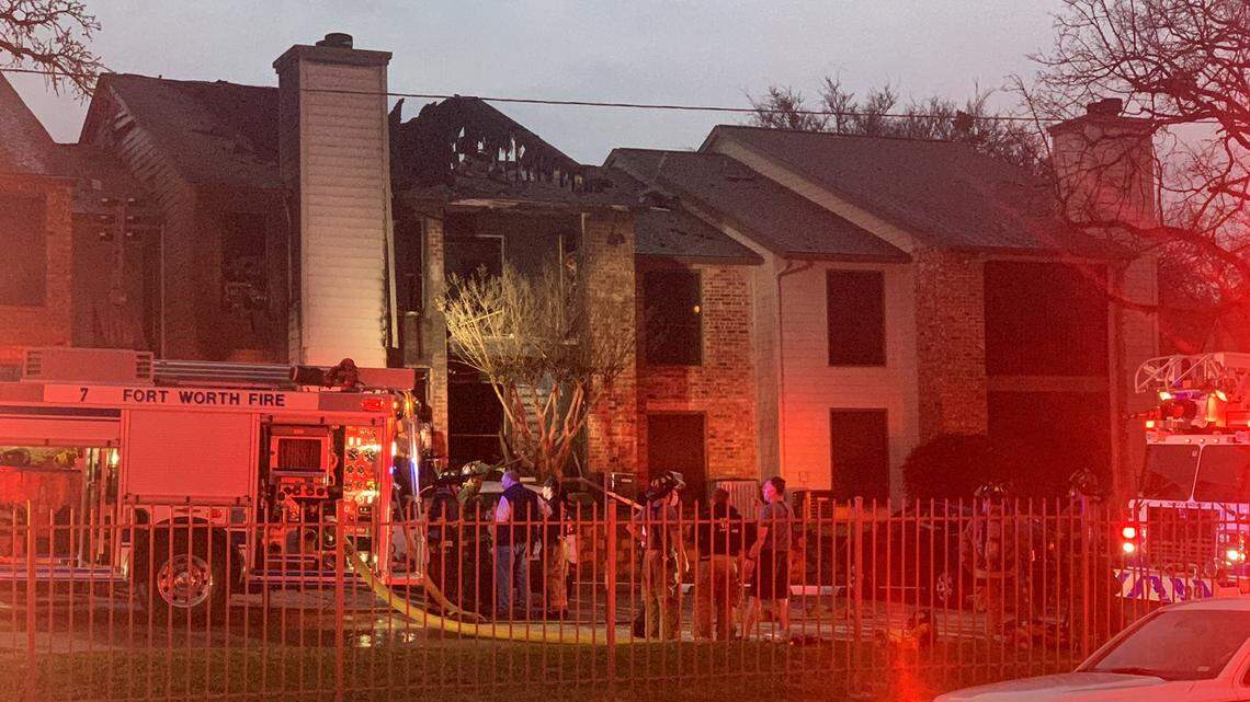 Fort Worth firefighters respond to a fire at an apartment complex in the 9000 block of Sunridge Circle on Thursday morning. The fire heavily damaged four units and left 20 tenants displaced, according to the fire department.