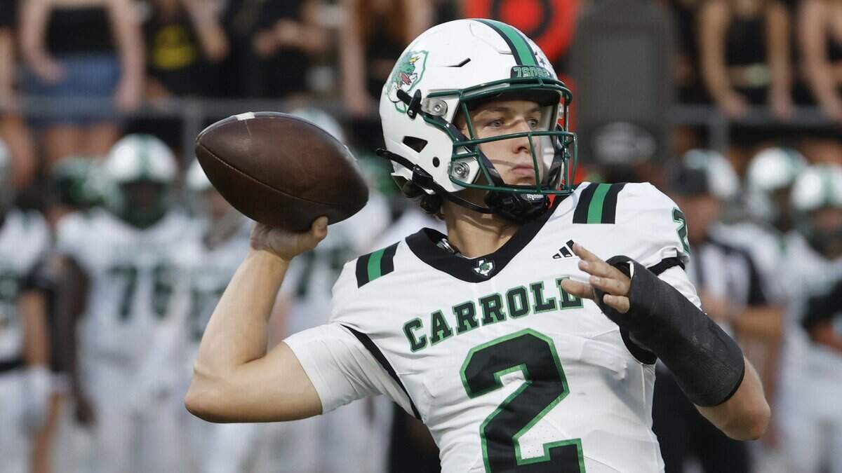 Southlake quarterbaack Angelo Renda (2) tosses a sideline pass during the first half of a UIL football game between Southlake Carroll and Byron Nelson at Northwest ISD Stadium in Justin, Texas, Friday, Sept. 12, 2025.