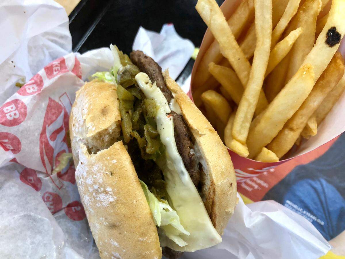 The Dairy Queen green  chile Hungr-Buster: served with lettuce, chilies and ranch dressing on a jalapeno bun.