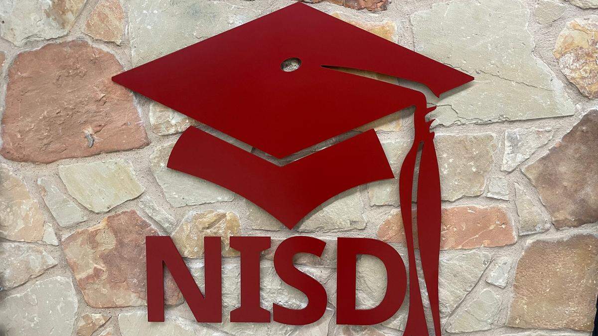 The Northwest school district Thursday night selected an interim superintendent after David Hicks, its previous leader, died unexpectedly Sept. 9.