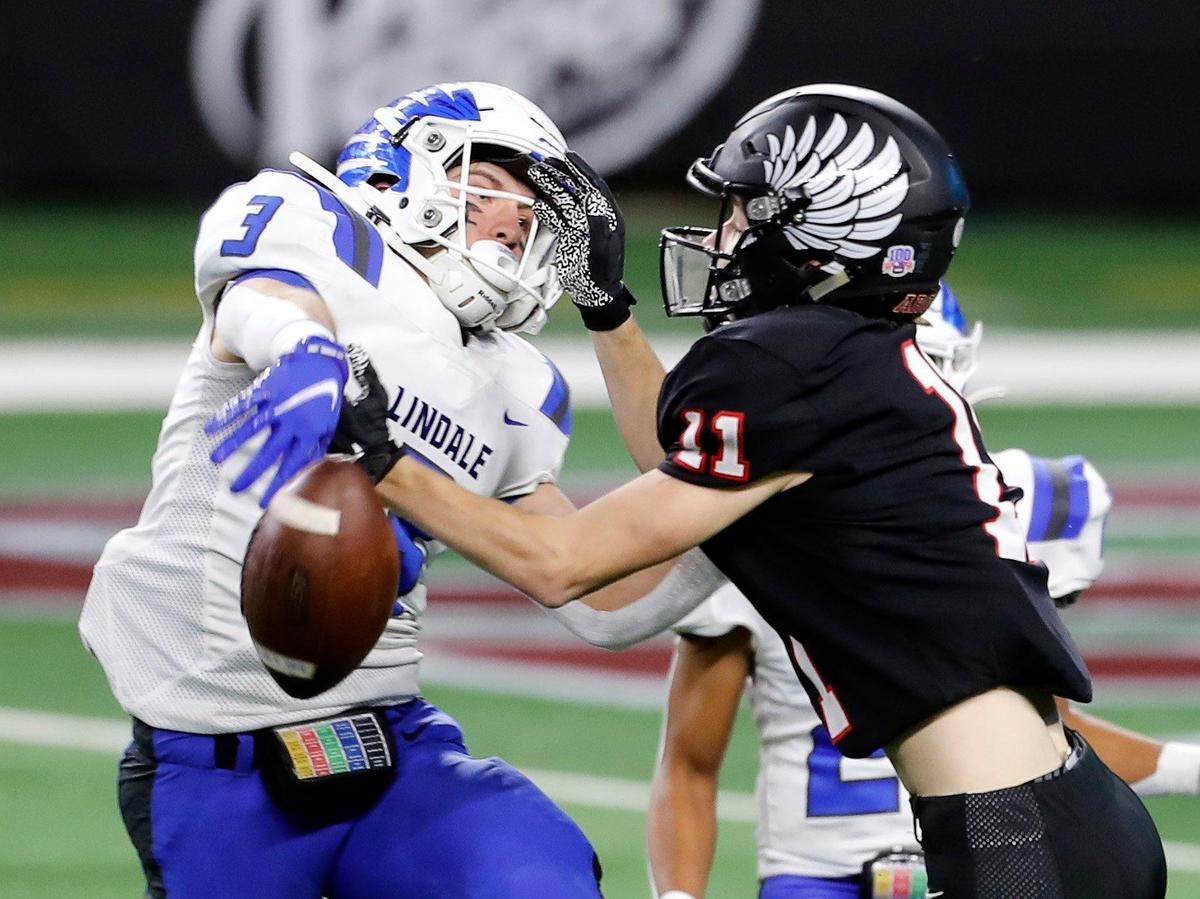 Lindale’s Jacob Seekford (3) breaks up a pass intended for Argyle wide receiver Ward McCollum (11) during a Conference 4A Division 1 State Championship football game at AT&T Stadium in Arlington, Texas, Friday, Dec. 18, 2020. (Special to the Star-Telegram Bob Booth)