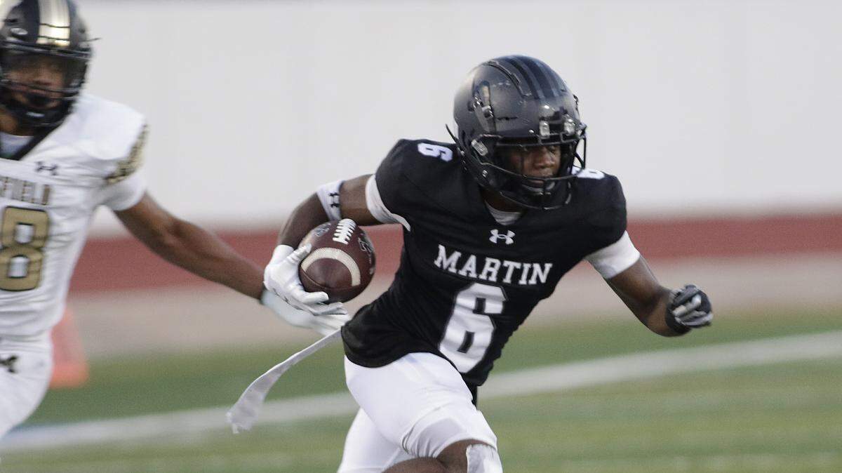 Arlington Martin’s Daylon Cobb (6) looks for running room against Mansfield during their game on Thursday, September 11, 2025 at Maverick Stadium in Arlington Texas.