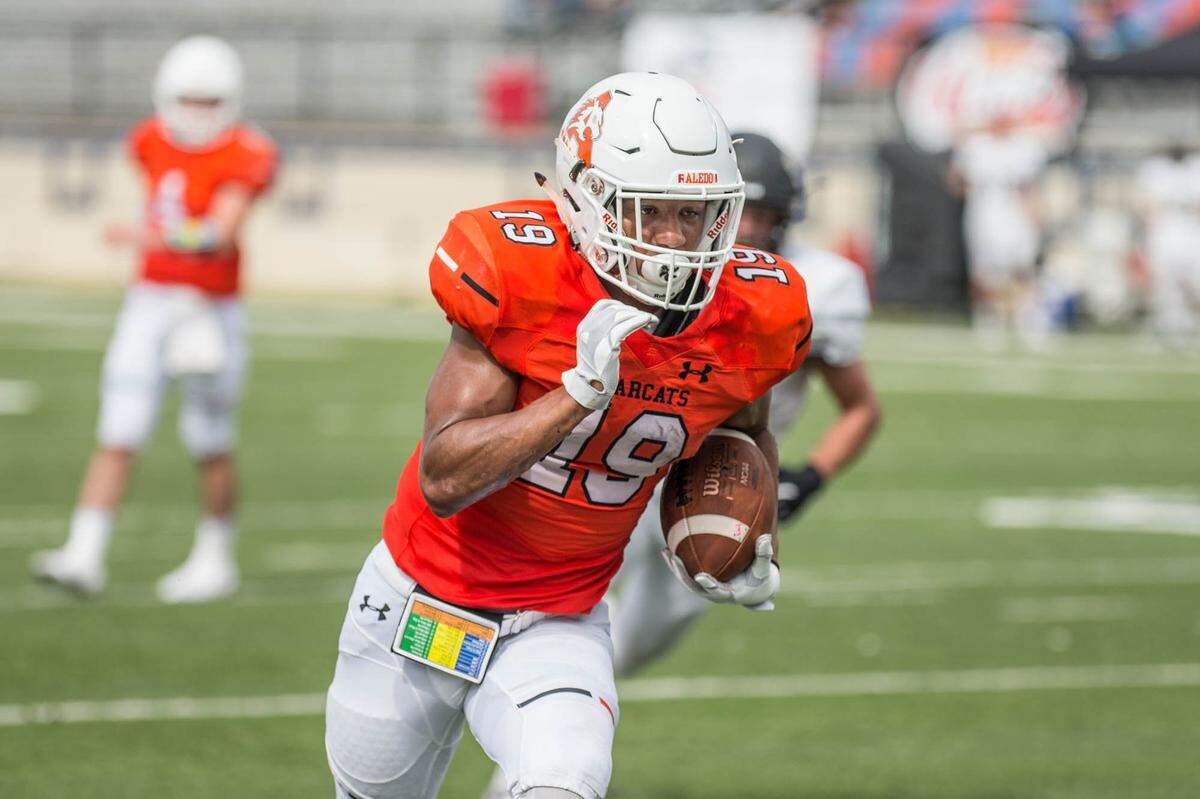 Aledo’s Tre Owens runs in a 9-yard TD run vs. Bentonville, Ark. during Shreveport’s Battle on the Border, Saturday September 8, 2018.