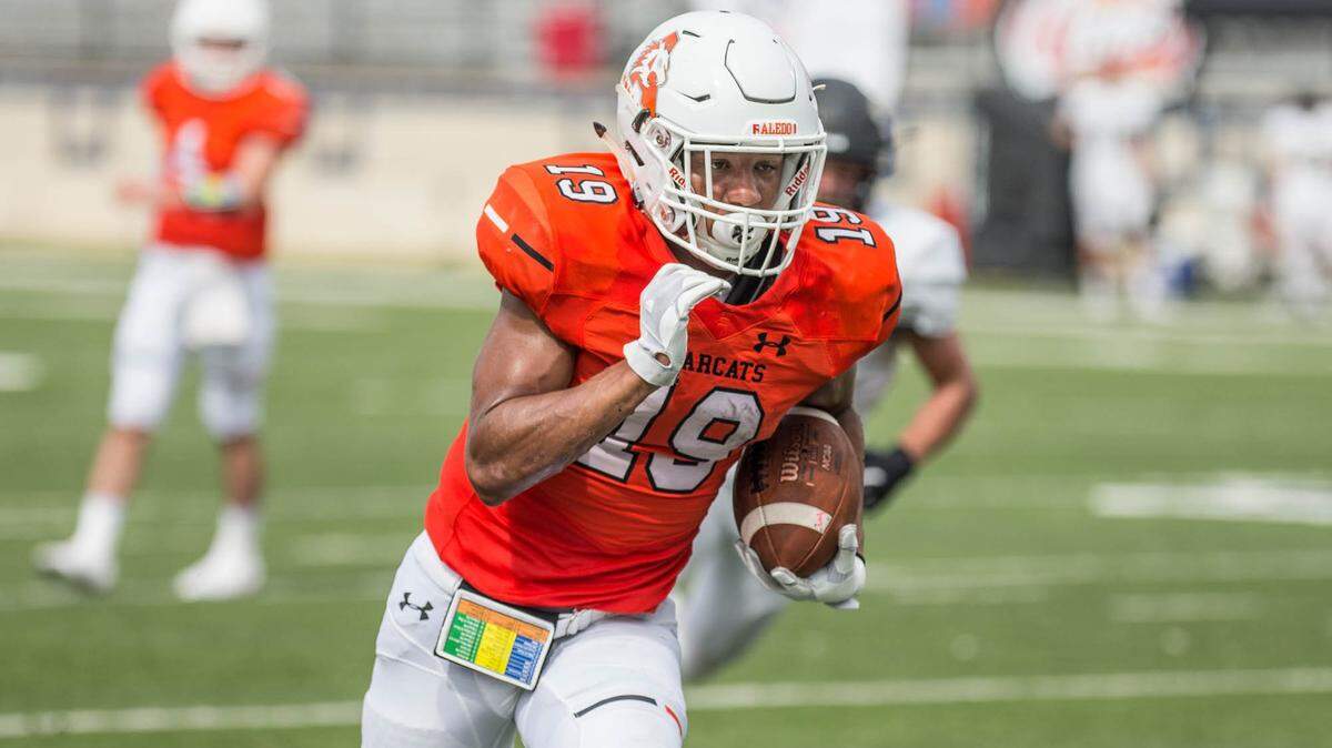 Aledo’s Tre Owens runs in a 9-yard TD run vs. Bentonville, Ark. during Shreveport’s Battle on the Border, Saturday September 8, 2018.