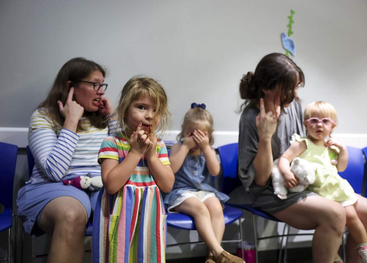 Claire Gigli, 4, sings along to Head, Shoulders, Knees and Toes during a Music and Movement class at the Southwest Regional Library on Thursday, July 9, 2026 in Fort Worth. The program designed for 3 to 5 year olds usually takes place from 10:30 to 11:15 a.m. on Thursdays.