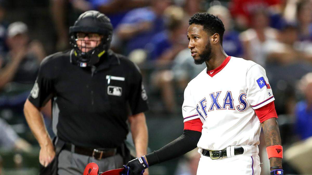 Texas Rangers first baseman Jurickson Profar is called out on strikes by home plate umpire Gary Cederstrom against the Tampa Bay Rays, Tuesday night, September 18, 2018 played at Globe Life Park in Arlington, TX.