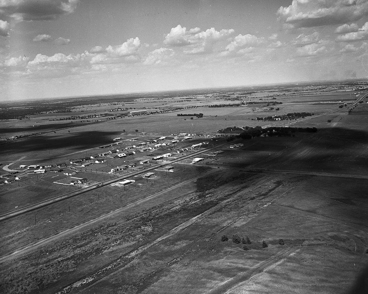 Aug. 3, 1951: This view looking northeast shows the entire 255-acre tract purchased by General Motors Corp. for a future plant of Buick-Oldsmobile-Pontiac division in Arlington. The site is bounded on the north by U.S. Highway 80 and T&P tracks, on east by Watson Road, on south by East Abram Street, and on west by Parkview addition.