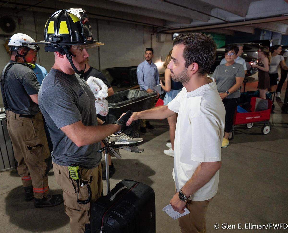 Fort Worth firefighters helped collect personal items on Monday, June 30, for residents displaced by the June 23 fire at The Cooper apartments on West Rosedale Street.