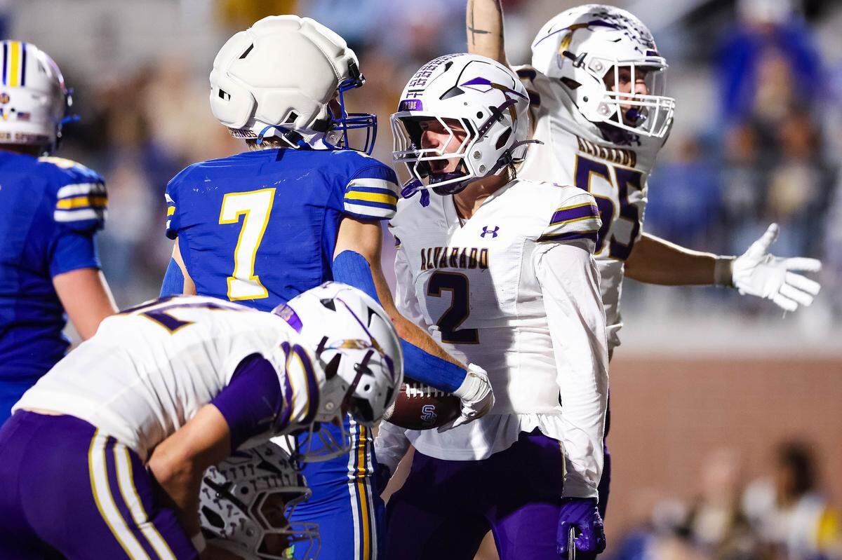 Alvarado defensive player Layne Woolard (2) yells in celebration after Sulphur Springs running back Jaxson Haire (7) was tackled for a safety in a Class 4A Division I area playoff game Friday.