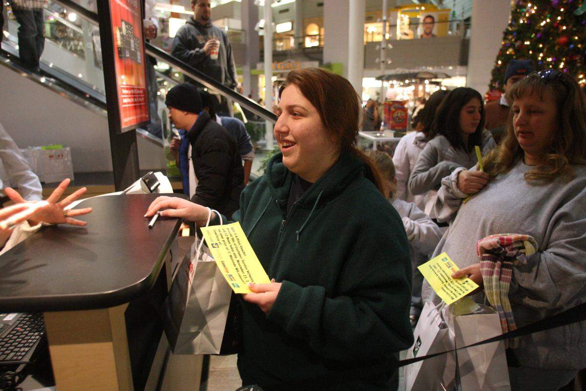 Nov. 23, 2007: Jennifer McMillen of Arlington wins a free Wii after standing in line before 6 a.m. at Parks Mall in Arlington.