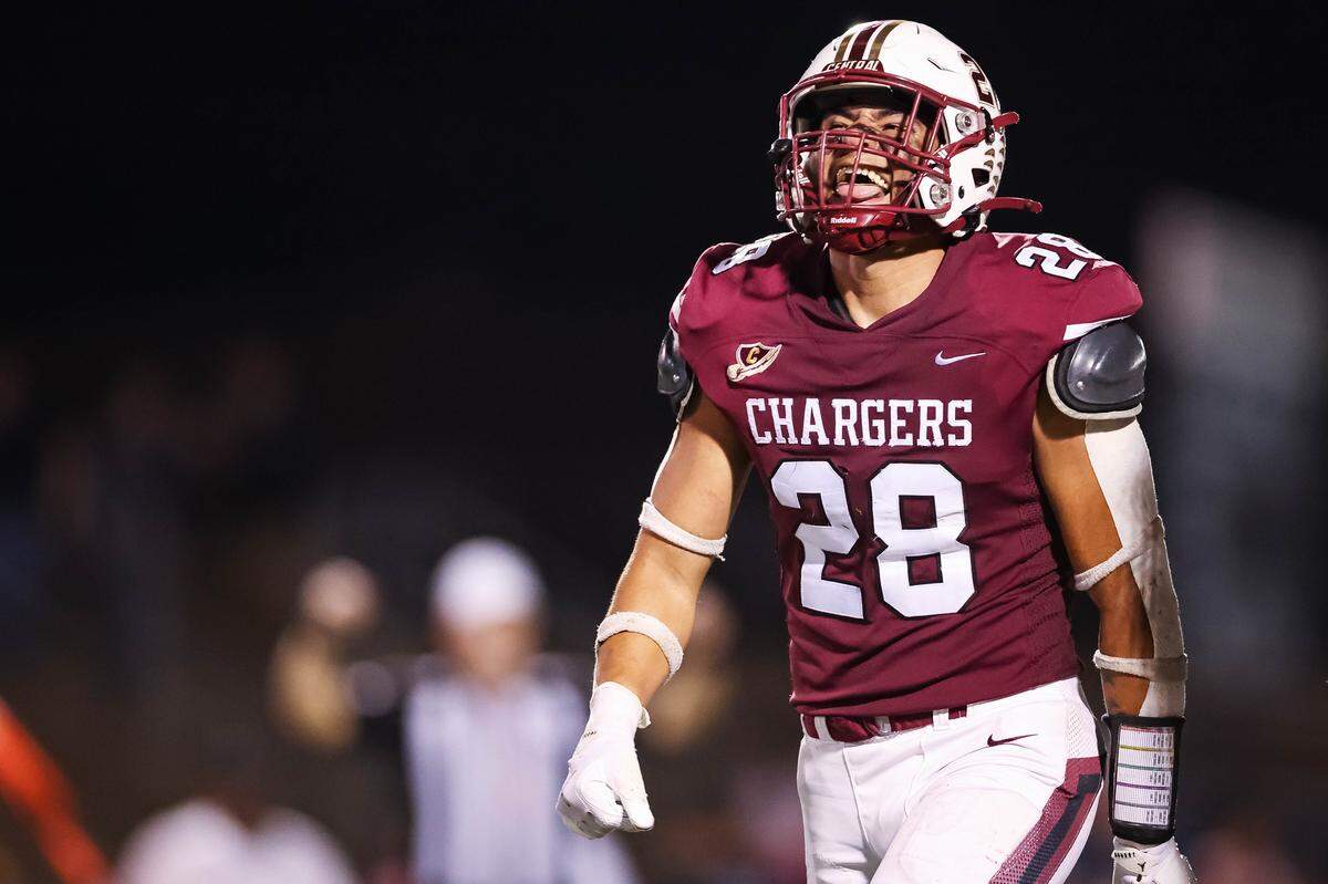 Keller Central kicker Austin Martin sticks his tongue out in celebration after throwing a pass for a touchdown on a fake field goal attempt during a district game between Keller Central and L.D. Bell at Keller ISD Stadium in Keller, Texas on October 16, 2025.