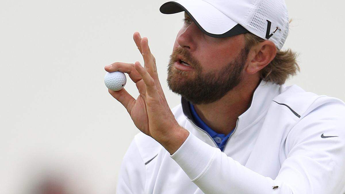 PGA Tour veteran Lucas Glover, here pictured at the 2011 British Open, is not playing at this weekend's AT&T Byron Nelson in Dallas as he deals with a domestic violence incident where he was assaulted by his wife.
