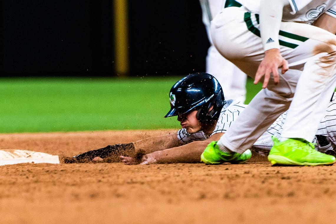 Ethan Mendoza (1) steals 2nd base during a game between Carroll and Prosper at Globe Life Field in Arlington during the High School Baseball Showcase on February 28, 2021. Photo by Matt Smith. (Special to the Star-Telegram).