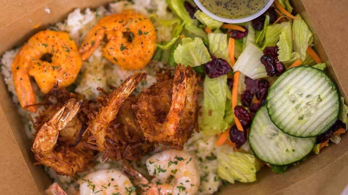 Expect four types of shrimp at Coco Shrimp: butter-garlic, spicy, lemon-herb and coconut. Each version comes on a bed of white rice and paired with a side salad drizzled with creamy ginger dressing.