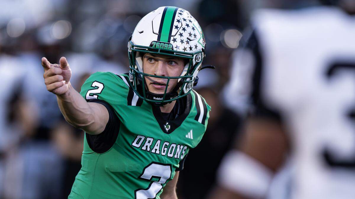 Southlake Carroll quarterback Angelo Renda calls for motion at the goal line in the second half of a game against Euless Trinity on Sept. 19 at Dragon Stadium in Southlake.