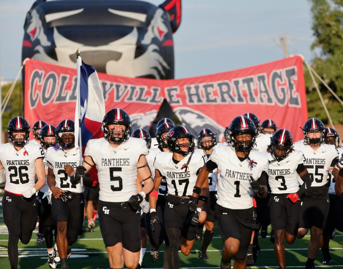 The Panthers enter the field before a UIL football game at Birdville Fine Arts and Activity Center in North Richland Hills Friday, Sept. 6, 2004.