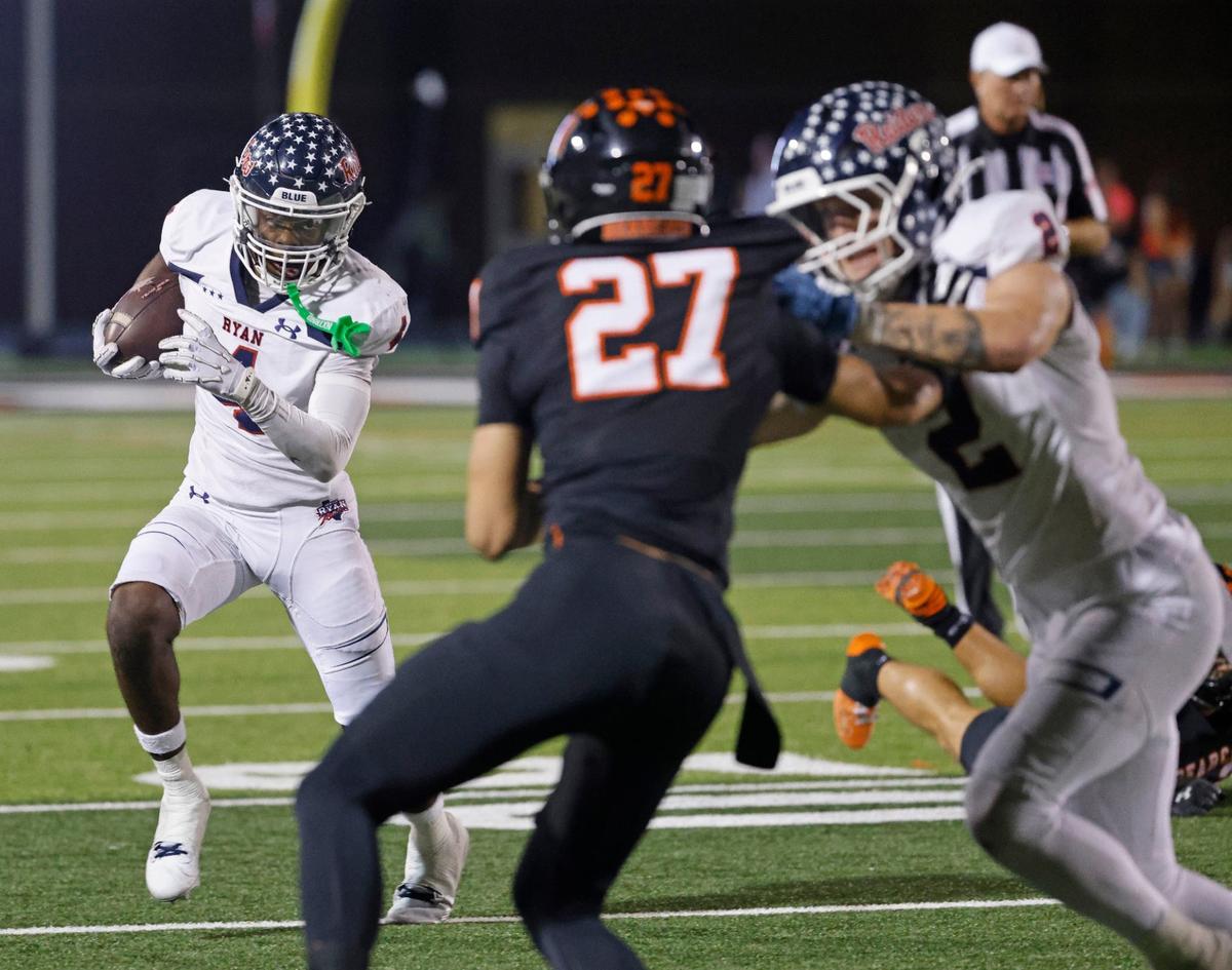 Denton Ryan running back Tre’Vaughn Reynolds (4) cuts to the outside during a UIL football game at Buchanan Stadium in Aledo Texas, Friday, Oct. 04, 2024.