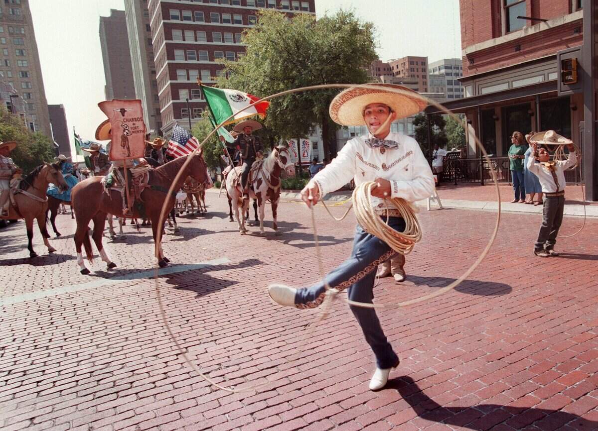 Sept. 11, 1999: Juan Jose Oropeza, 14, of Fort Worth performs rope tricks during the Mexican Independance Day Parade in downtown Fort Worth.