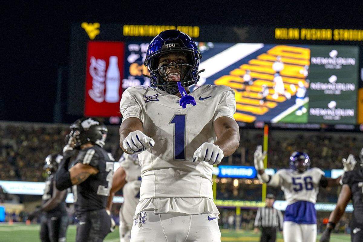 MORGANTOWN, WEST VIRGINIA - OCTOBER 25: Eric McAlister #1 of the TCU Horned Frogs celebrates in the end zone during a game against the West Virginia Mountaineers at Milan Puskar Stadium on October 25, 2025 in Morgantown, West Virginia. (Photo by Brien Aho/Getty Images)