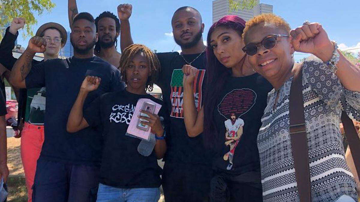 Six of the nine protesters released from the Dallas County Jail today were photographed moments after getting out of jail with Lesa Pamplin, (right) one of the attorneys who engineered their release on Tuesday.
