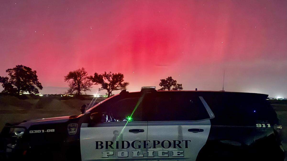 The Bridgeport Police Department captured this rare view of the Northern Lights glowing above North Texas on Tuesday night.