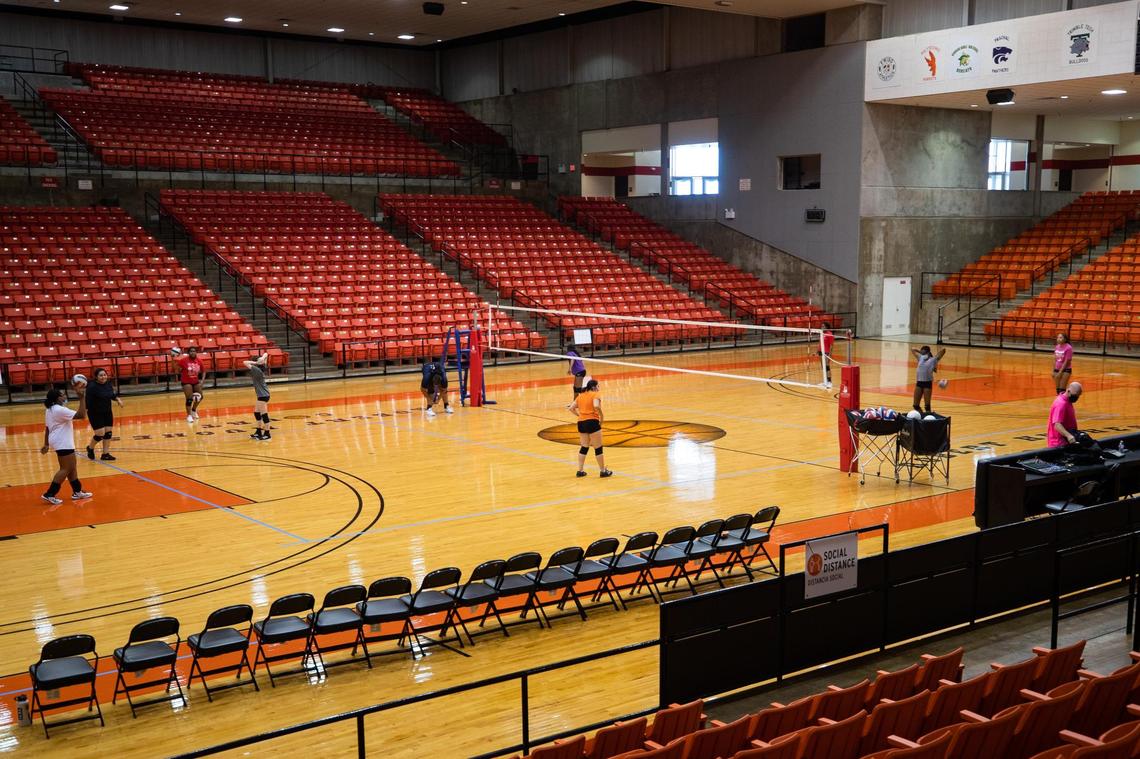 Young Women’s Leadership Academy volleyball team practices before the team heads to playoffs for the first time Oct. 20, 2021, at Wilkerson-Greines Activity Center in Fort Worth. The team doesn’t have a home court and has to commute more than 10 minutes to the district court.