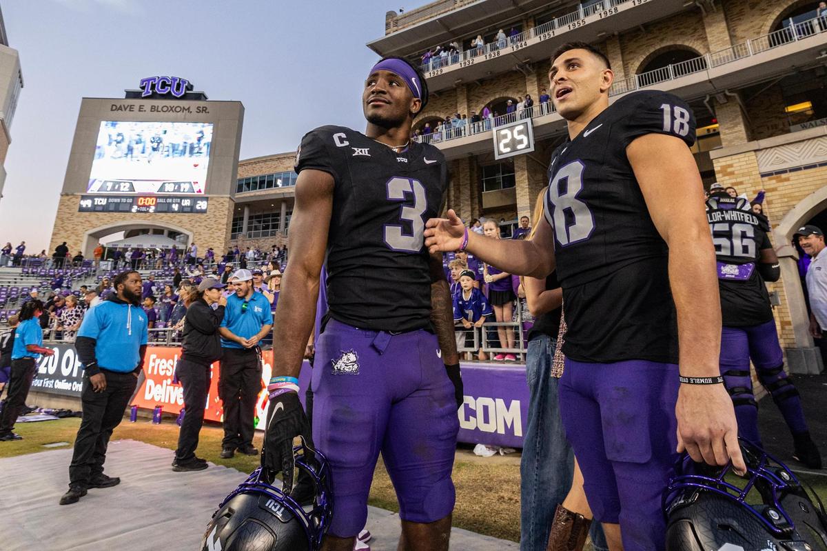 TCU wide receivers Savion Williams (3) and Jack Bech (18) take one last look at the home field as a player after defeating Arizona 49-28 in a NCAA football game at Amon G. Carter Stadium in Fort Worth on Saturday, Nov. 23, 2024.